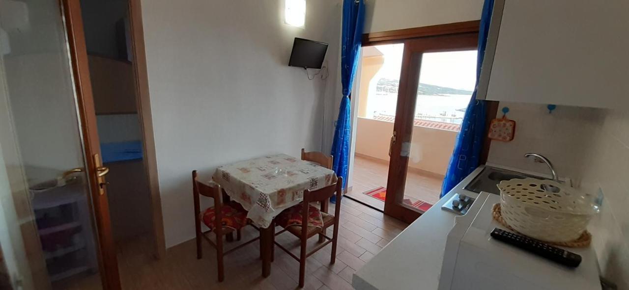 Fronte Mare Attico Indipendente Ed Esclusivo Con Terrazza Panoramica Apartment Isola Rossa Luaran gambar