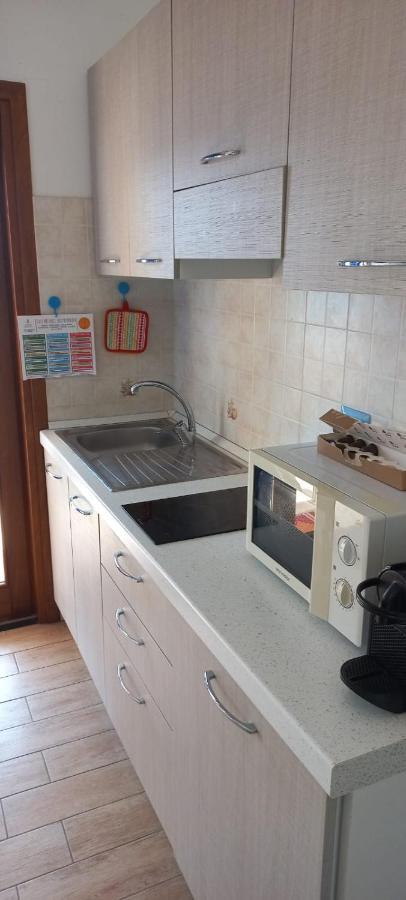 Fronte Mare Attico Indipendente Ed Esclusivo Con Terrazza Panoramica Apartment Isola Rossa Luaran gambar